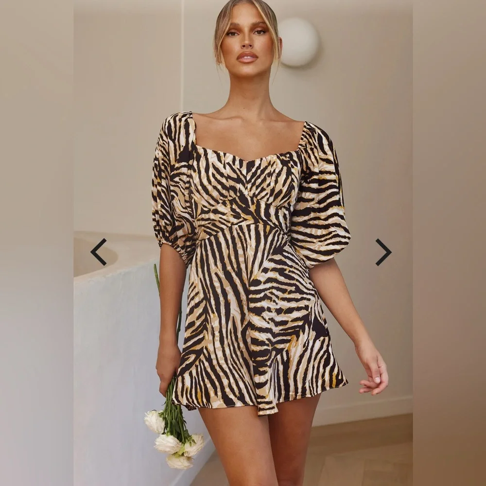 Selfie Leslie mini dress
Zebra Print Puff Sleeve Dress - Picture 2 of 4